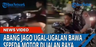 ABANG JAGO Ugal-ugalan Angkat Ban Depan Sepeda Motor di Jalan Raya, Akhirnya Ditangkap Polisi